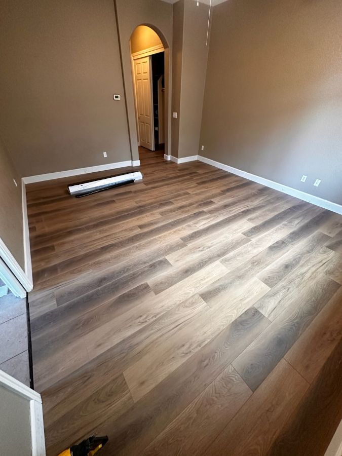 Wood Look laminate floor installation at Rays Carpet One